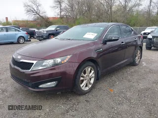 2013 Kia Optima EX with VIN 5XXGN4A74DG111397, listed as a IAAI auction lot 41977063 with 113,571 mi miles. Bid and sale history available at carsss.com. Image 2.