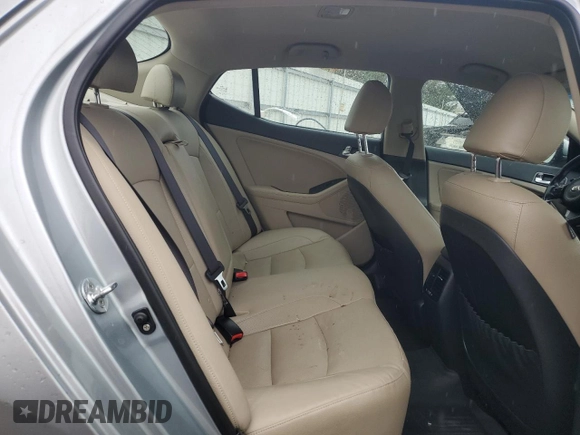 2014 Kia Optima Hybrid EX with VIN KNAGN4AD2E5069076, listed as a Copart auction lot 79523534 with 93,504 mi miles and Salvage Title. Bid and sale history available at carsss.com. Image 10.
