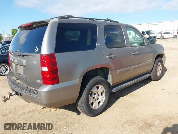 2007 Chevrolet Tahoe LS z VIN 1GNFC13027R231885, wystawiony jako IAAI lot #42750247 z przebiegiem 167 072 mil mil oraz . Historia ofert i sprzedaży dostępna na DreamBid. Obrazek 4.