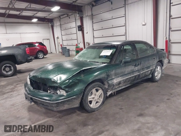 1997 Pontiac Bonneville SE z VIN 1G2HX52KXVH250272, wystawiony jako IAAI lot #41644041 z przebiegiem 160 791 mil mil oraz . Historia ofert i sprzedaży dostępna na DreamBid. Obrazek 18.