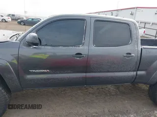 2015 Toyota Tacoma with VIN 3TMMU4FN0FM085444, listed as a IAAI auction lot 41388229 with 139,802 mi miles and . Bid and sale history available at DreamBid. Image 15.
