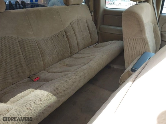 1999 Chevrolet Silverado 1500 LS with VIN 2GCEC19T8X1142580, listed as a IAAI auction lot 41932320 with 238,377 mi miles. Bid and sale history available at carsss.com. Image 8.