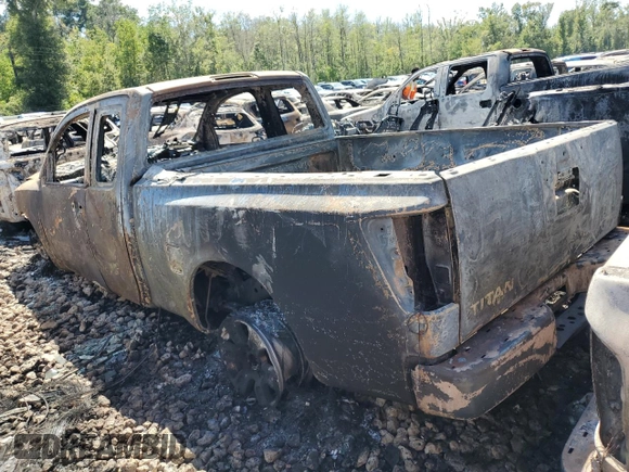 2010 Nissan Titan SE with VIN 1N6BA0CH0AN325143, listed as a Copart auction lot 66860214 with 77,033 mi miles and Salvage Title. Bid and sale history available at carsss.com. Image 2.