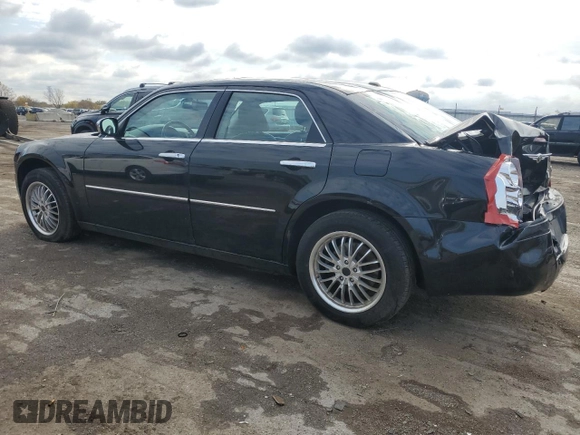 2009 Chrysler 300 with VIN 2C3LK33V19H614083, listed as a Copart auction lot 77529014 with 188,125 mi miles and Salvage title. Bid and sale history available at DreamBid. Image 2.