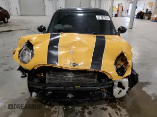 2009 MINI Hardtop z VIN WMWMF33549TU70310, wystawiony jako Copart lot #57797815 z przebiegiem 136 843 mil mil oraz Szkody całkowita. Historia ofert i sprzedaży dostępna na DreamBid. Obrazek 5.