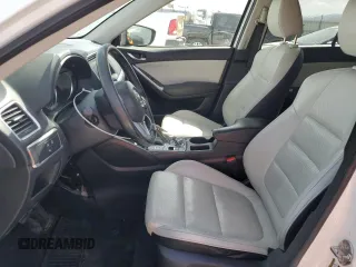 2016 Mazda CX-5 Grand Touring with VIN JM3KE4DY3G0688286, listed as a Copart auction lot 52182205 with 194,352 mi miles and Salvage Title. Bid and sale history available at DreamBid. Image 7.