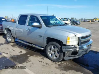2010 Chevrolet Silverado 1500 LT with VIN 3GCRCSE02AG163989, listed as a IAAI auction lot 42111090 with 158,921 mi miles and . Bid and sale history available at DreamBid. Image 1.