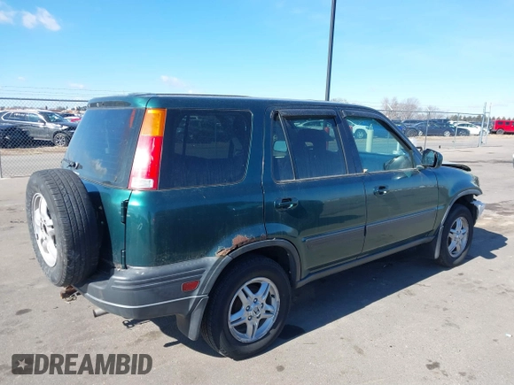 2000 Honda CR-V EX with VIN JHLRD176XYC035377, listed as a IAAI auction lot 41694054 with 196,985 mi miles. Bid and sale history available at carsss.com. Image 4.