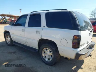 2002 GMC Yukon SLT with VIN 1GKEC13Z02J244875, listed as a IAAI auction lot 41657514 with 329,288 mi miles. Bid and sale history available at carsss.com. Image 3.