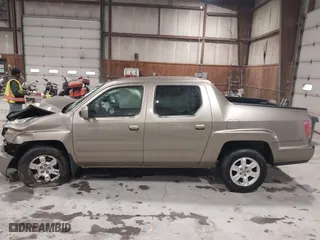 2011 Honda Ridgeline RTS with VIN 5FPYK1F4XBB008020, listed as a IAAI auction lot 41817310 with 227,803 mi miles. Bid and sale history available at carsss.com. Image 14.