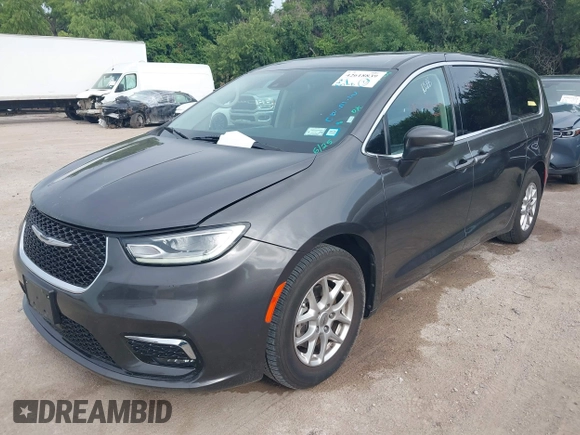 2023 Chrysler Pacifica Touring L with VIN 2C4RC1BG8PR594481, listed as a IAAI auction lot 42618839 with 60,748 mi miles and . Bid and sale history available at DreamBid. Image 17.