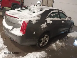 2016 Cadillac ATS Standard AWD z VIN 1G6AG5RX4G0120667, wystawiony jako IAAI lot #41512947 z przebiegiem 106 209 mil mil oraz . Historia ofert i sprzedaży dostępna na DreamBid. Obrazek 4.