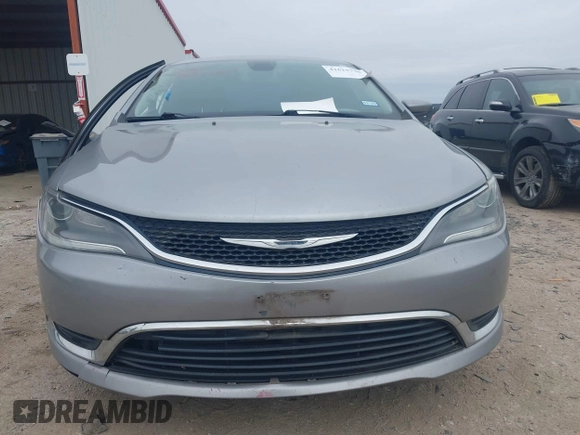 2015 Chrysler 200 Limited with VIN 1C3CCCAB7FN670991, listed as a IAAI auction lot 41625738 with 194,534 mi miles and . Bid and sale history available at DreamBid. Image 12.