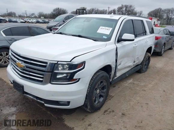 2017 Chevrolet Tahoe LT with VIN 1GNSKBKC1HR401044, listed as a IAAI auction lot 41573362 with 103,865 mi miles and . Bid and sale history available at DreamBid. Image 17.