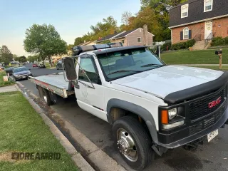2000 GMC Sierra 1500 with VIN 1GDKC34F9YF421333, listed as a Copart auction lot 57167145 with 120,490 mi miles and Clean Title. Bid and sale history available at DreamBid. Image 1.