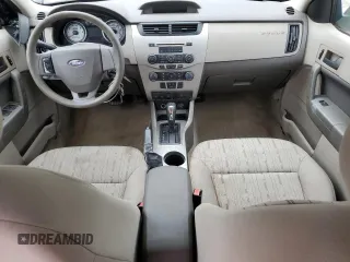2009 Ford Focus SE z VIN 1FAHP35N69W138629, wystawiony jako Copart lot #58012605 z przebiegiem 155 557 mil mil oraz Szkoda całkowita • Salvage title. Historia ofert i sprzedaży dostępna na DreamBid. Obrazek 8.