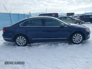 2013 Volkswagen Passat SEL Premium z VIN 1VWCP7A32DC089517, wystawiony jako IAAI lot #41546511 z przebiegiem 149 067 mil mil oraz . Historia ofert i sprzedaży dostępna na DreamBid. Obrazek 13.