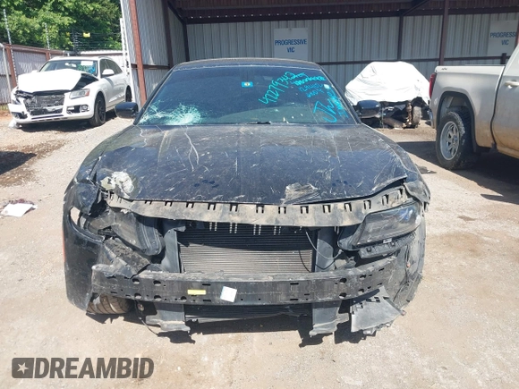 2015 Dodge Charger SXT with VIN 2C3CDXHG5FH928553, listed as a IAAI auction lot 42279342 with 129,402 mi miles and . Bid and sale history available at DreamBid. Image 13.