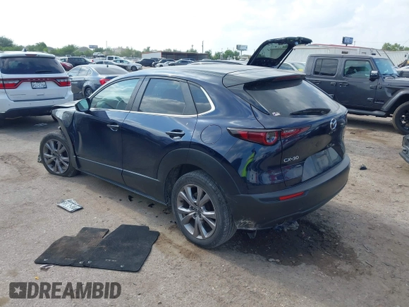 2021 Mazda CX-30 Select with VIN 3MVDMABL6MM202166, listed as a IAAI auction lot 42169618 with 95,931 mi miles and . Bid and sale history available at DreamBid. Image 3.