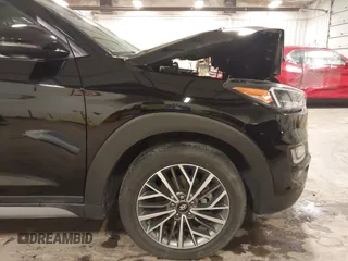 2021 Hyundai Tucson Limited with VIN KM8J3CAL6MU385001, listed as a IAAI auction lot 42230850 with 30,439 mi miles and . Bid and sale history available at DreamBid. Image 19.