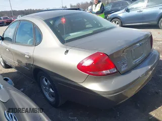 2004 Ford Taurus SE with VIN 1FAFP532X4G152810, listed as a IAAI auction lot 41639876 with 98,718 mi miles and . Bid and sale history available at DreamBid. Image 3.
