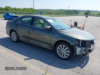 2012 Toyota Camry XLE z VIN 4T1BD1FK7CU037762, wystawiony jako IAAI lot #42253606 z przebiegiem 130 888 mil mil oraz . Historia ofert i sprzedaży dostępna na DreamBid. Obrazek 1.