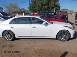 2019 Genesis G90 3.3T Premium with VIN KMHG34JA4KU053344, listed as a IAAI auction lot 41189899 with 15,663 mi miles. Bid and sale history available at carsss.com. Image 13.
