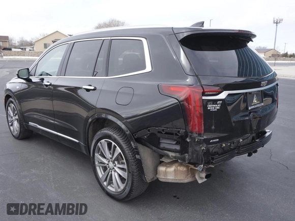 2021 Cadillac XT6 Premium Luxury z VIN 1GYKPDRS3MZ113033, wystawiony jako Copart lot #50076845 z przebiegiem 104 248 mil mil oraz Szkody całkowita. Historia ofert i sprzedaży dostępna na DreamBid. Obrazek 4.
