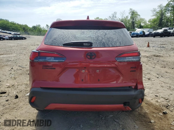 2022 Toyota Corolla Cross XLE with VIN 7MUDAABG5NV005882, listed as a Copart auction lot 56690265 with 6,427 mi miles and Salvage title. Bid and sale history available at DreamBid. Image 6.