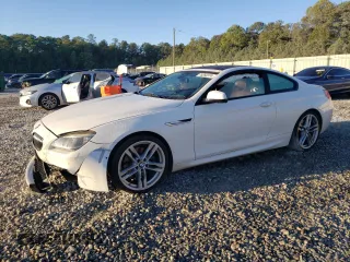 2015 BMW 6 Series 650i xDrive z VIN WBAYM1C54FD325365, wystawiony jako Copart lot #75265374 z przebiegiem 82 432 mil mil oraz Szkoda całkowita • Salvage title. Historia ofert i sprzedaży dostępna na DreamBid. Obrazek 1.