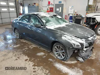2017 Cadillac CTS Luxury AWD with VIN 1G6AX5SS5H0175404, listed as a IAAI auction lot 41584754 with 231,354 mi miles and . Bid and sale history available at DreamBid. Image 1.