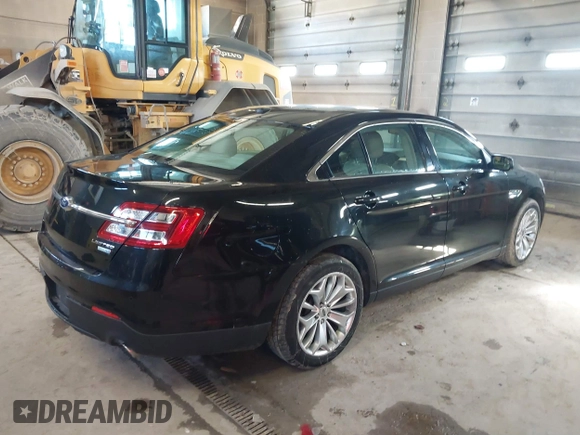 2015 Ford Taurus Limited with VIN 1FAHP2J87FG172580, listed as a IAAI auction lot 41891567 with 183,784 mi miles. Bid and sale history available at carsss.com. Image 4.