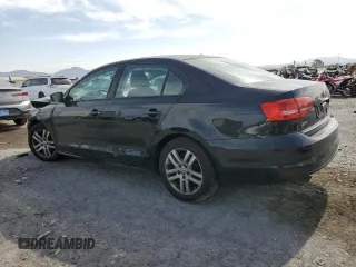2015 Volkswagen Jetta S with VIN 3VW2K7AJ3FM355363, listed as a Copart auction lot 58516655 with 140,688 mi miles and Salvage title. Bid and sale history available at DreamBid. Image 2.