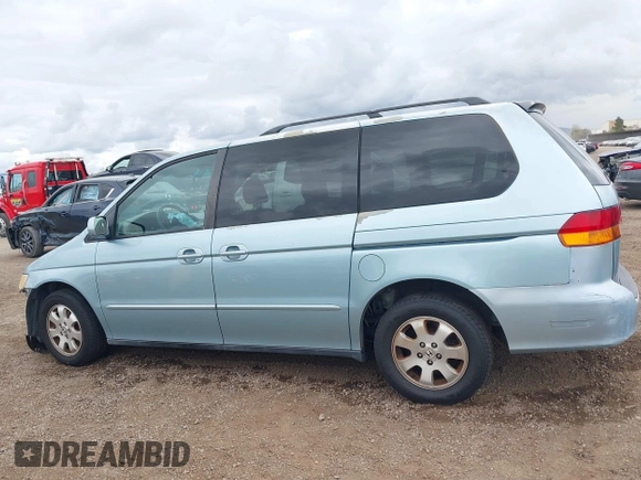 2004 Honda Odyssey EX-L with VIN 5FNRL18064B060817, listed as a IAAI auction lot 42032796 with 200,999 mi miles and . Bid and sale history available at DreamBid. Image 15.