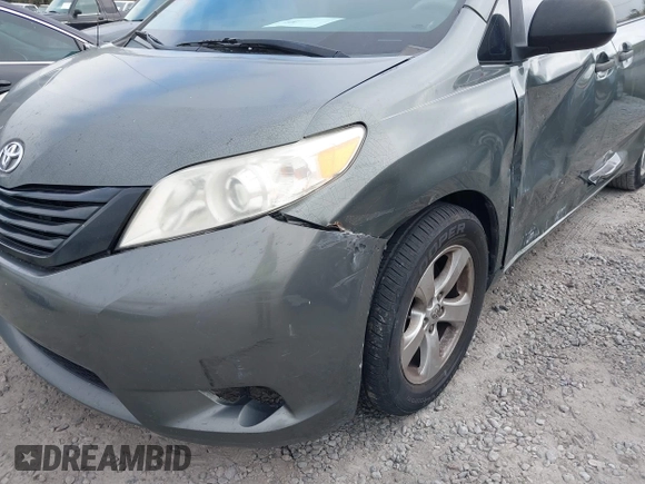 2014 Toyota Sienna L with VIN 5TDZK3DC6ES421278, listed as a IAAI auction lot 41178679 with 202,823 mi miles. Bid and sale history available at carsss.com. Image 19.