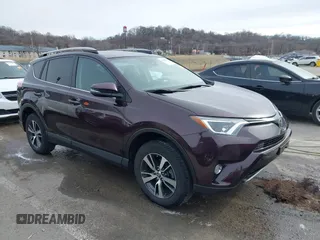 2018 Toyota RAV4 XLE with VIN 2T3RFREV6JW857693, listed as a IAAI auction lot 41541902 with 62,415 mi miles. Bid and sale history available at carsss.com. Image 1.