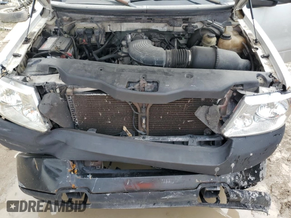 2005 Ford F-150 XL with VIN 1FTRF14WX5NA45001, listed as a Copart auction lot 77180384 with 367,053 mi miles and Salvage Title. Bid and sale history available at carsss.com. Image 11.