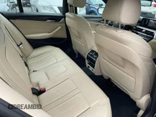 2017 BMW 5 Series 540i xDrive with VIN WBAJE7C36HG890783, listed as a Copart auction lot 55098475 with 128,332 mi miles and Clean title. Bid and sale history available at DreamBid. Image 6.