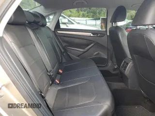 2015 Volkswagen Passat SE с VIN 1VWBS7A39FC063364, выставлен на аукционе Copart как лот 69635734 с пробегом 143 658 миль миль и Списание • Salvage title. История ставок и продаж доступна на DreamBid. Изображение 10.
