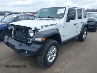 2021 Jeep Wrangler Unlimited Willys Sport with VIN 1C4HJXDG8MW596171, listed as a IAAI auction lot 41856841 with 86,353 mi miles and . Bid and sale history available at DreamBid. Image 2.