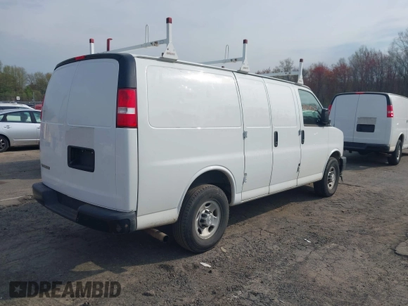2017 Chevrolet Express Cargo Van with VIN 1GCWGAFF7H1120858, listed as a IAAI auction lot 42124363 with 163,848 mi miles. Bid and sale history available at carsss.com. Image 4.