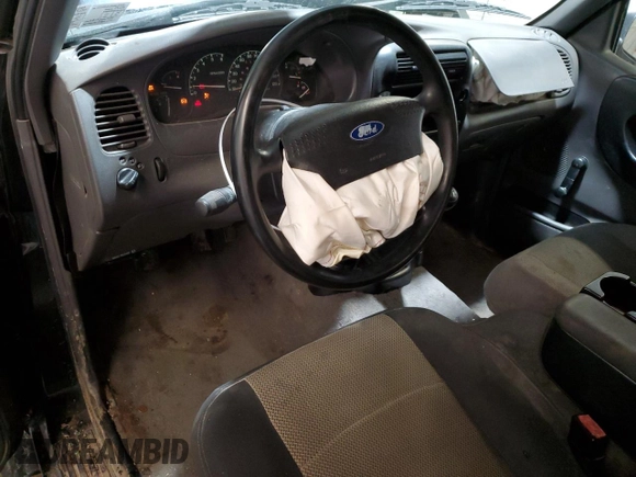 2002 Ford Ranger with VIN 1FTZR15U52PA08409, listed as a Copart auction lot 87858015 with 128,892 mi miles and Salvage Title. Bid and sale history available at DreamBid. Image 8.