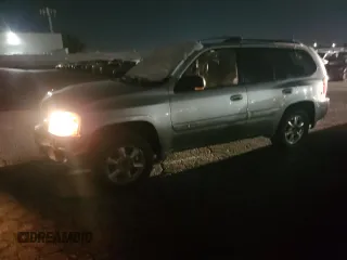 2002 GMC Envoy SLT with VIN 1GKDT13S522286497, listed as a Copart auction lot 84501384 with 207,226 mi miles and Salvage Title. Bid and sale history available at carsss.com. Image 1.