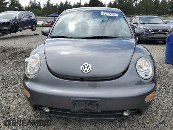 2004 Volkswagen Beetle z VIN 3VWCD31CX4M405570, wystawiony jako Copart lot #61769685 z przebiegiem 47 926 mil mil oraz Szkoda całkowita • Salvage title. Historia ofert i sprzedaży dostępna na DreamBid. Obrazek 5.