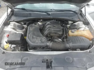 2012 Dodge Charger SE with VIN 2C3CDXBG4CH203207, listed as a Copart auction lot 69533004 with 156,015 mi miles and Salvage Title. Bid and sale history available at DreamBid. Image 11.