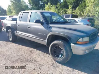 2002 Dodge Dakota with VIN 1B7HG48XX2S546383, listed as a IAAI auction lot 42860090 with 179,094 mi miles and . Bid and sale history available at DreamBid. Image 1.