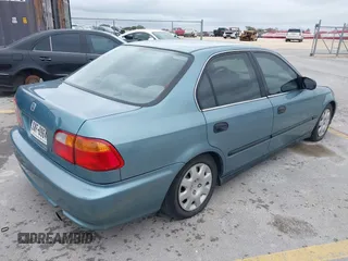 2000 Honda Civic LX with VIN 2HGEJ6571YH591699, listed as a IAAI auction lot 41799962 with 196,288 mi miles. Bid and sale history available at carsss.com. Image 4.