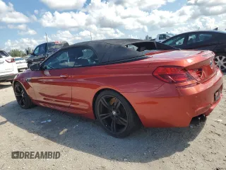 2017 BMW M6 z VIN WBS6G9C53HD932322, wystawiony jako Copart lot #72477344 z przebiegiem 76 325 mil mil oraz Czysty tytuł • Clean title. Historia ofert i sprzedaży dostępna na DreamBid. Obrazek 2.