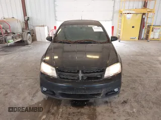 2013 Dodge Avenger SXT with VIN 1C3CDZCGXDN682929, listed as a IAAI auction lot 42689835 with 218,798 mi miles and . Bid and sale history available at DreamBid. Image 6.