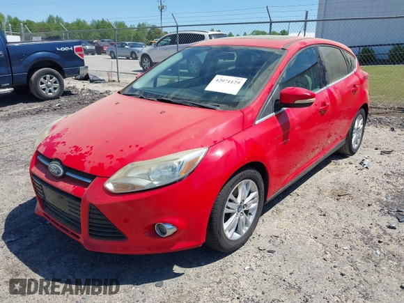 2012 Ford Focus SEL with VIN 1FAHP3M22CL213780, listed as a IAAI auction lot 42071129 with 151,924 mi miles. Bid and sale history available at carsss.com. Image 2.